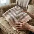 Granny Square Baby Blanket with shell boarder Pattern step 2 - assembly progress