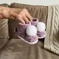 Plush Booties with Pompoms Pattern step 4 - final assembly and finishing