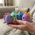 Colourful Mini Dino Amigurumi Pattern step 4 - final assembly and finishing
