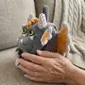 Baby Dino Backpack Amigurumi Pattern step 3 - details and accessories