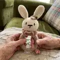 Bunny Baby Rattle with Teether Ring Amigurumi Pattern step 4 - final assembly and finishing